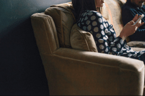 employee sitting on a couch