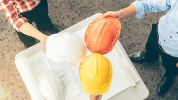 three hard hats put together