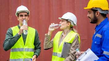 employees drinking water on jobsite