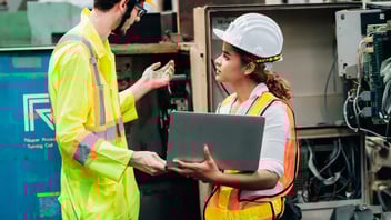 worker on laptop doing training