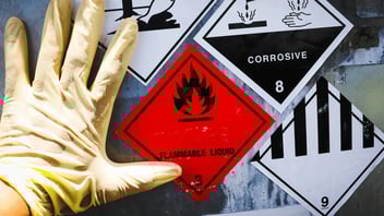 hanging a chemical hazard sign
