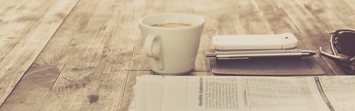coffee_cup_with_newspaper.jpg
