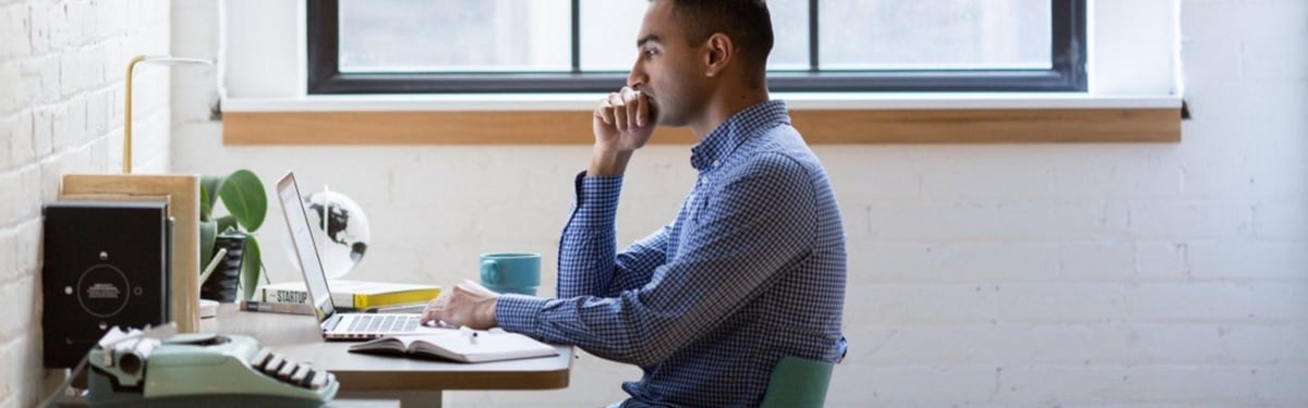employee doing online training at a desk - blog image.jpg