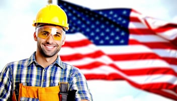 worker in front of american flag