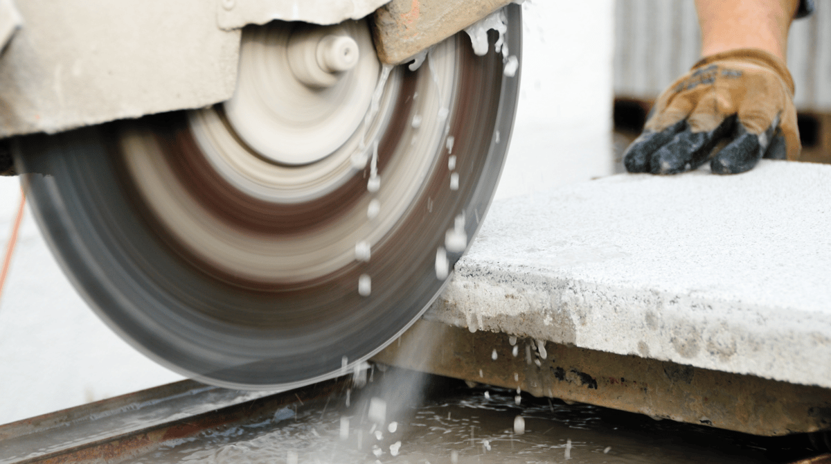 worker using a wet saw