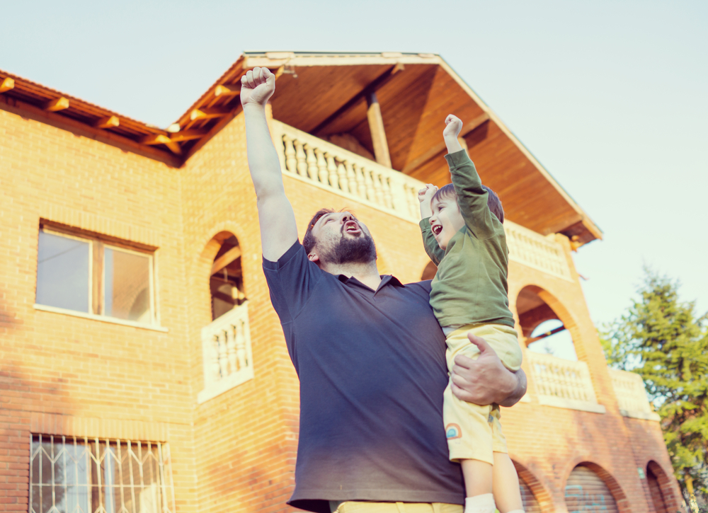 Excited father and son