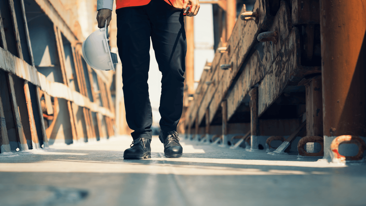 man walking down an isle at work