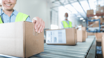 happy employees packaging orders