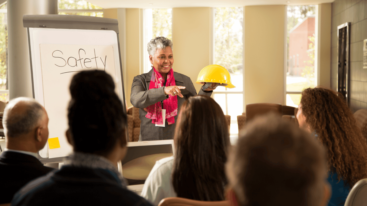 woman leading safety meeting