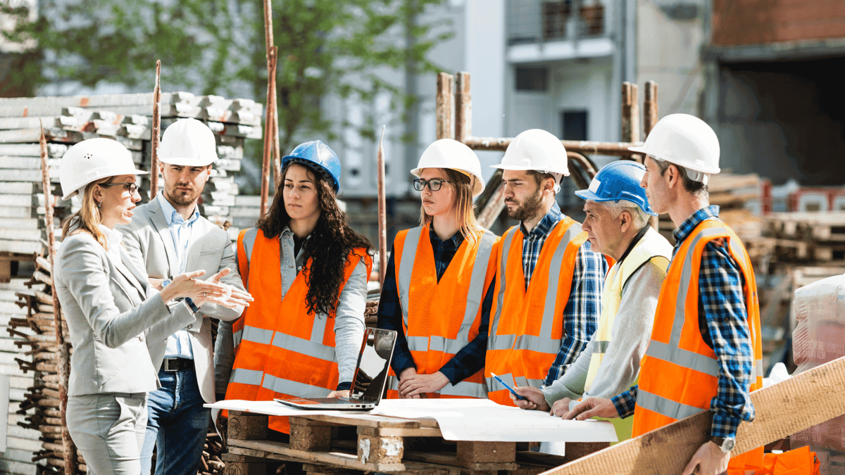 construction workers in a safety meeting
