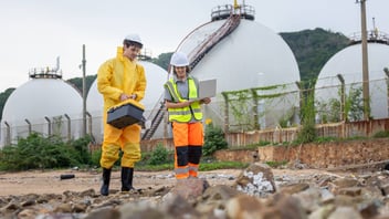 two employees on a job site