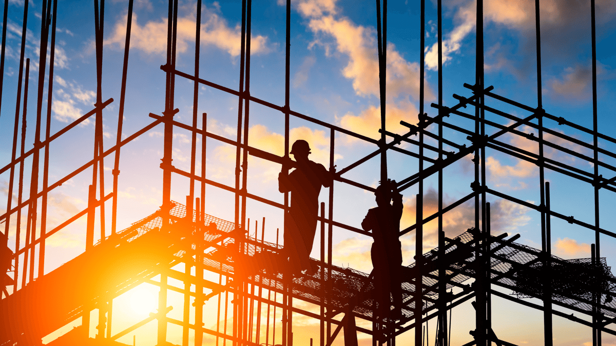 construction workers working on scaffolding