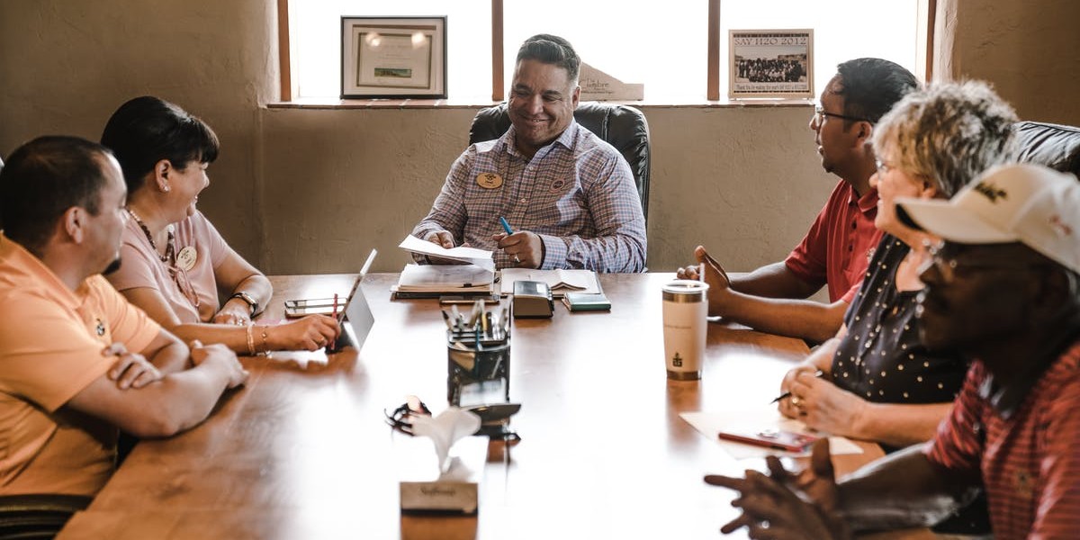 diverse group at table - diversity training - september 2018