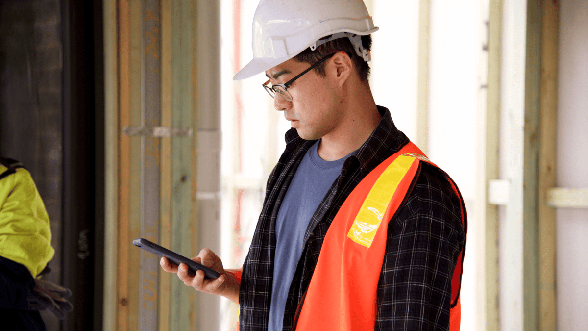 employee on phone doing training