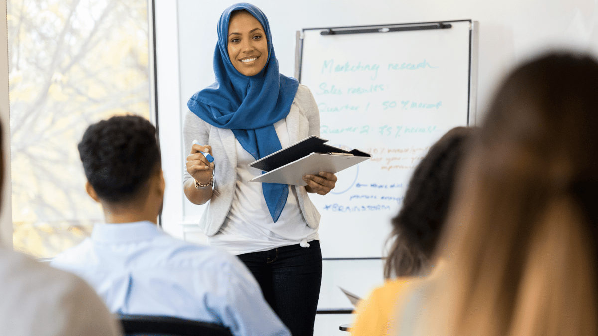employee training class led by woman