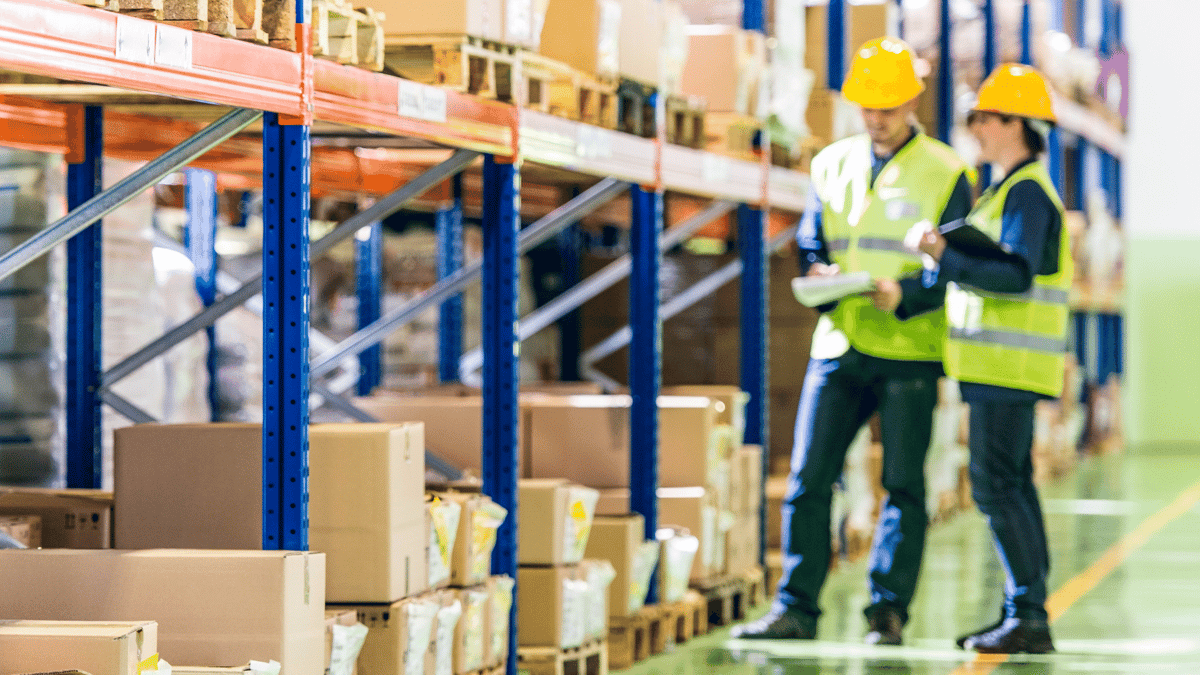 happy workers working in a warehouse