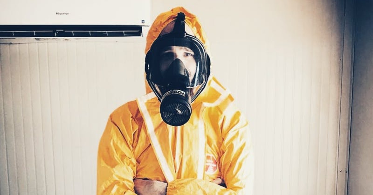 man in yellow hazmat suit