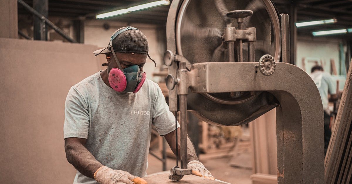 man working with proper PPE