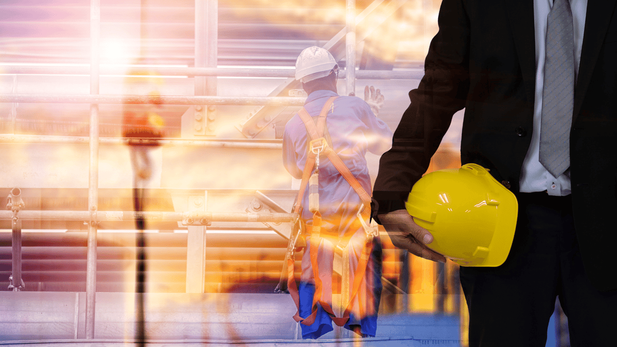 safety manager with employee in the field