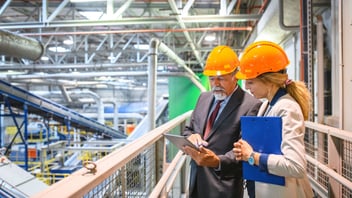 two employees handling quality management