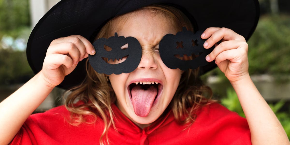witch girl with tongue out - halloween safety - october 2018