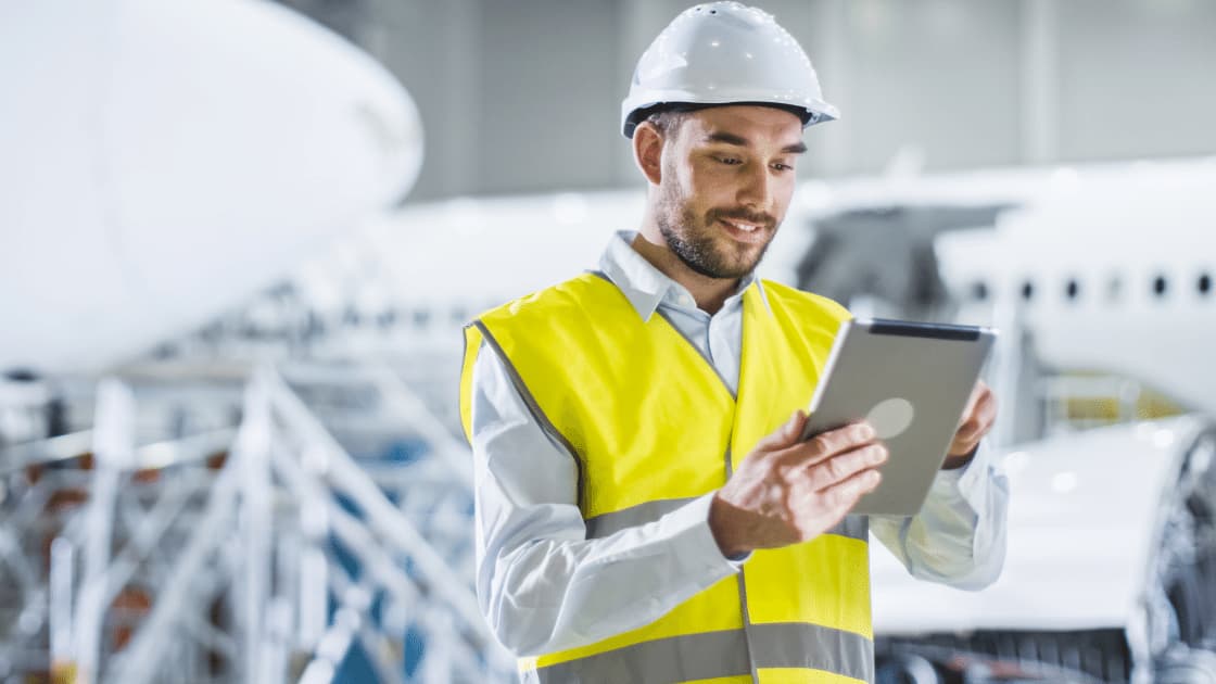worker doing safety training on an ipad