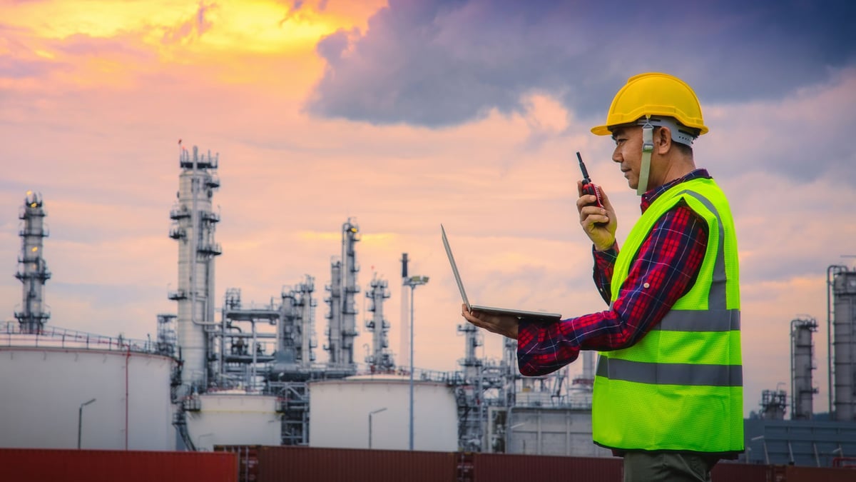worker using a laptop in the field