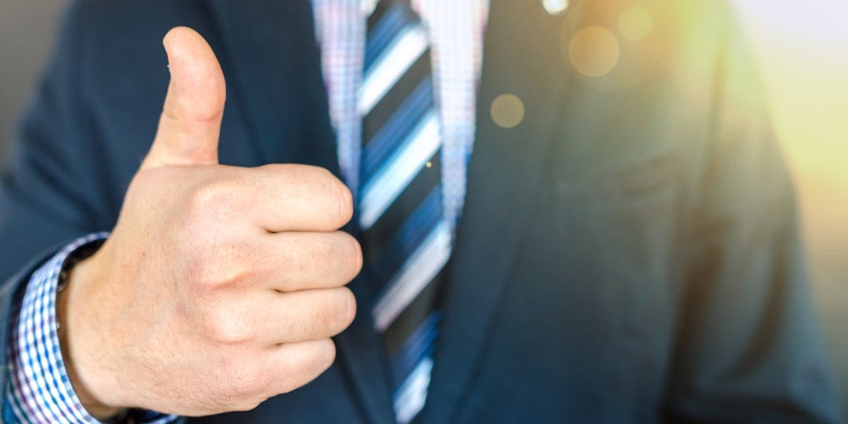 boss man in suit thumbs up - why upper management blog - september 2018