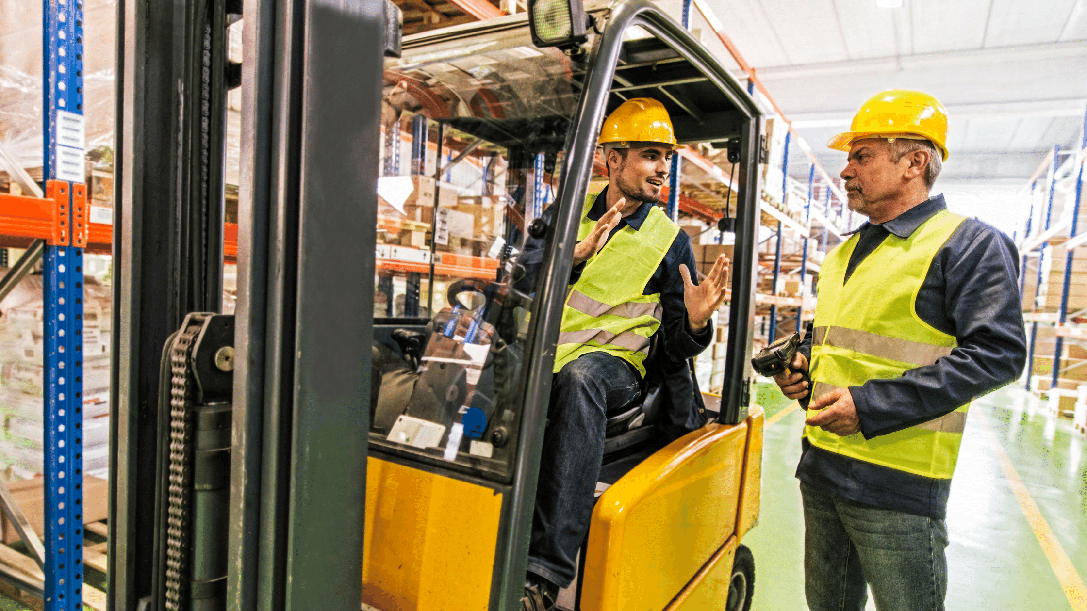 employees working on a forklift