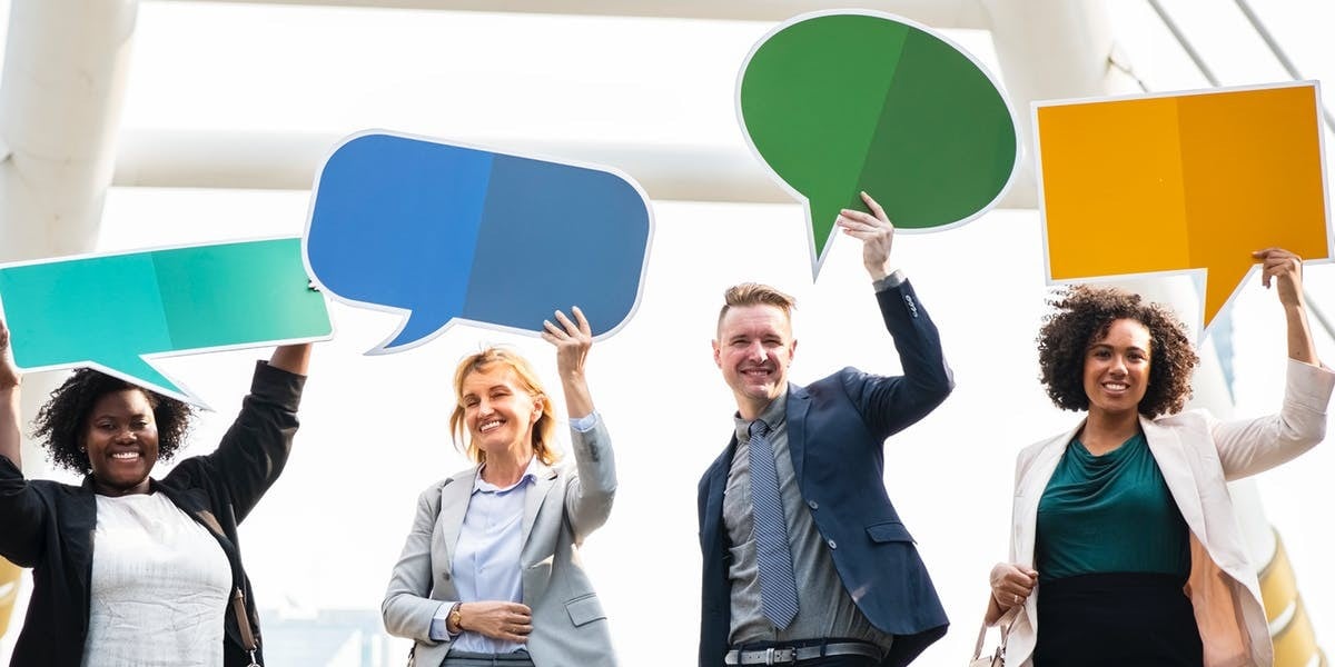 people holding speech bubbles - leadership quotes - august 2018
